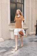 Robe courte à col polo et ourlet contrastant