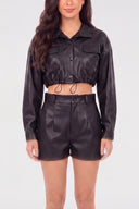 Veste en simili cuir ceinturée